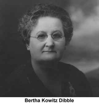 IMAGE/PHOTO: Bertha Kowitz Dibble: Black and white photograph of Bertha Kowitz Dibble in middle age; her hair is tightly permed and short, and she wears round mtal-framed glasses and a slight, thin smile.