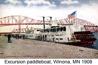 Color postcard photo of paddlewheel excursion boats on the river at Winona, MN in 1908