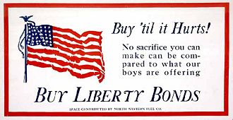 Color poster, showing the American flag, that says 'Buy 'til it Hurts! No sacrifice you can make can be compared to what our boys are offering. Buy Liberty Bonds