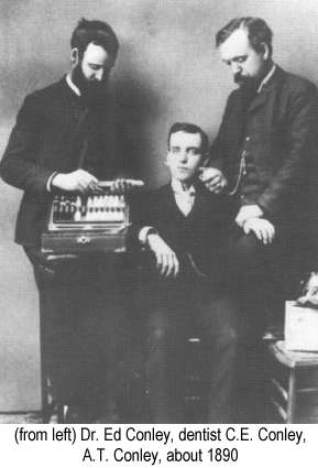 IMAGE/PHOTO: Dr. Ed Conley, dentist C.E. Conley, Dr. A.T. Conley, about 1890: Black and white photo of Drs. Ed and A.T. Conley pretending to use equipment to examine dentist C.E. Conley, about 1890