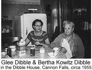 Black & white photo of Glee Dibble and Bertha Kowitz Dibble seated at a table in the dining room of the Dibble House in Cannon Falls, circa 1950