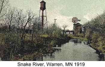 Color postcard painting of a watertower and windmill along the narrow Snake River at Warren, MN, 1919